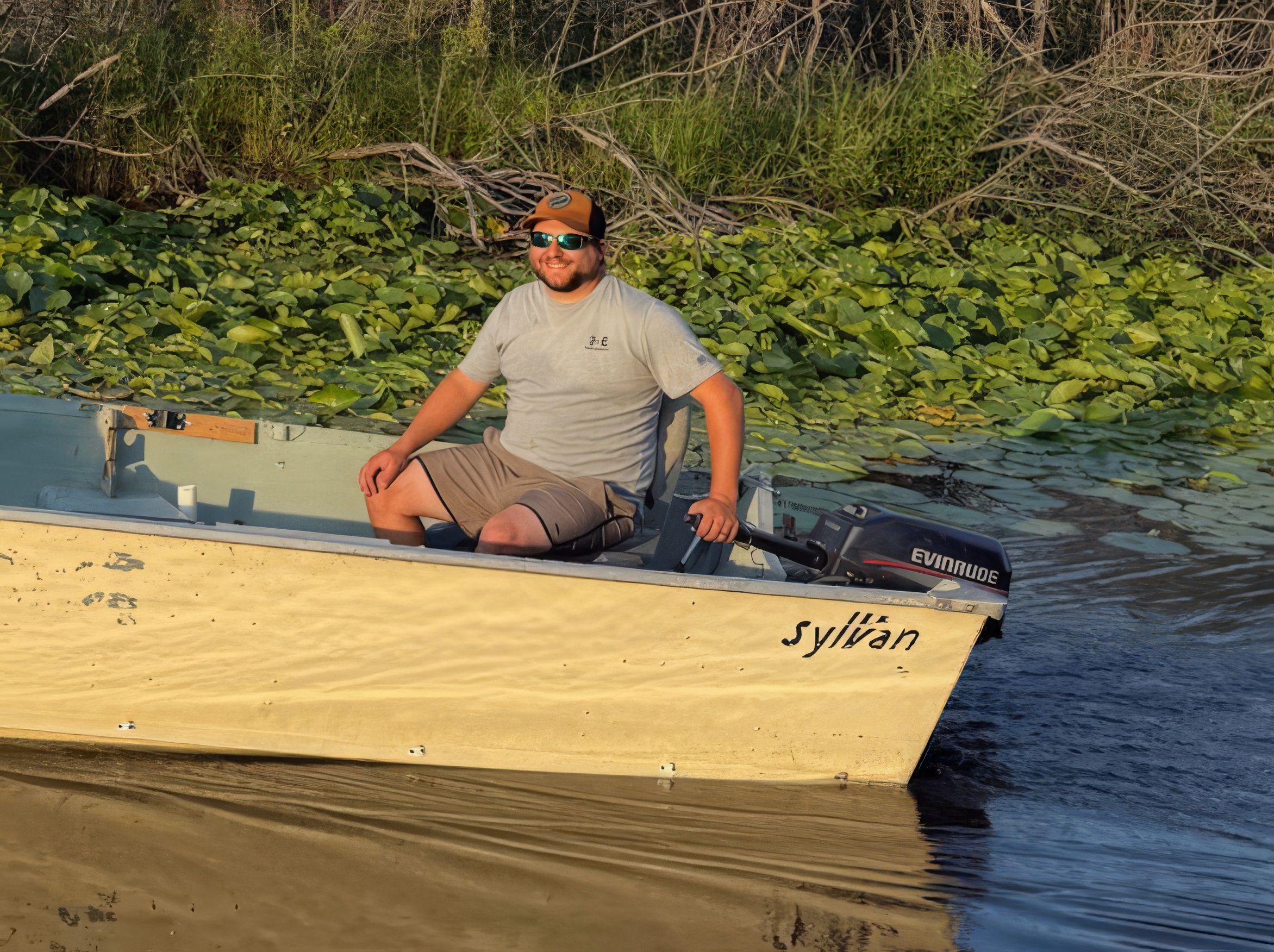 Eddie Bosas Jr. motoring his fishing boat toward Squaw Lake
